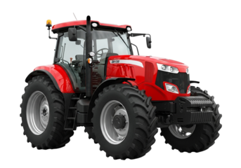 Powerful red agricultural tractor with large tires
