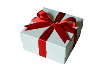Obraz premium Elegant white gift box tied with a luxurious red satin ribbon, perfect for celebrations, surprises, and expressing gratitude.