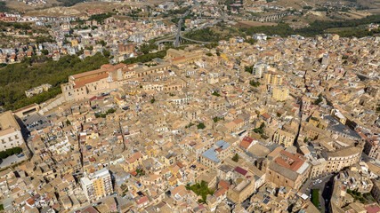 Aerial view of the historic center of Agrigento, Sicily, Italy. This Sicilian capital, located on a hilltop, was known in ancient times as Akragas. It's a beautiful, sunny summer day.