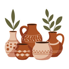 A collection of decorative ceramic vases with painted patterns and small plants.