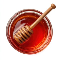 Overhead shot of honey in glass jar with wooden dipper on white background sweet treat healthy food ingredient