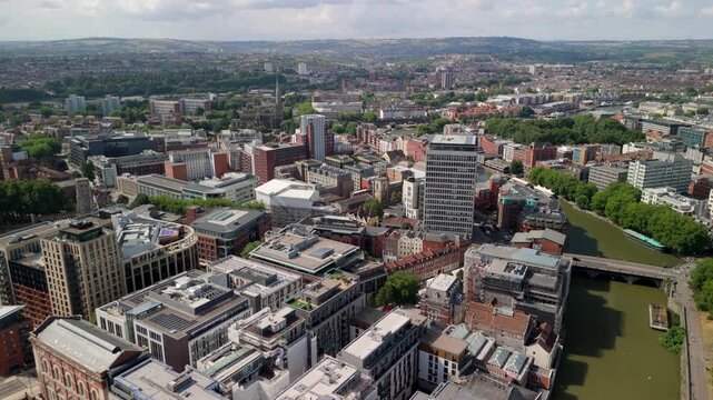 Bristol UK: 28th Jul 2025: A clear view of Bristol city from Castle Park with modern buildings and the river flowing through the urban landscape