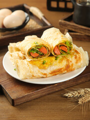 Savory Ham and Egg Crepes Ready to Eat on Wooden Board