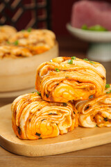 Handmade Spicy Meat Pasta Rolls with Scallions on Wooden Board - Fresh Breakfast Buns