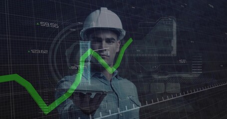 Showing engineer wearing white helmet light shirt holding hologram tower at AR lab green graph HUD