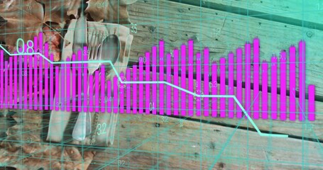 Displaying magenta bar chart overlaying rustic table, showing cyan trend line, cutlery, walnuts © vectorfusionart