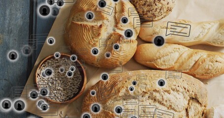 Fototapeta premium Displaying assortment of artisan breads on parchment at studio table, with seed bowl overlays