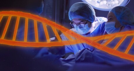 Operating lead surgeon wearing glasses, masks and blue scrubs working in OR, with glowing DNA helix