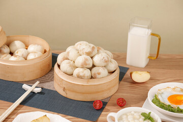 Traditional Chinese Xiao Long Bao Dumplings in Bamboo Steamers with Soup - Asian Cuisine Preparation