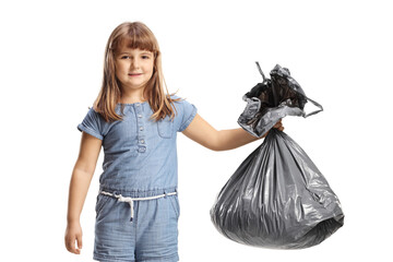 Little girl holding a plastic waste bag