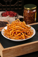 Pickled Papaya Salad with Shredded Radish Strips - Traditional Asian Cold Appetizer Dish