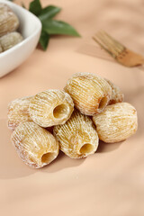 Dried Jujube Dates Red Chinese Fruits Candied Natural Healthy Snack Food on Wood Background