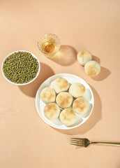 Traditional Mung Bean Pastries with Green Beans and Tea - Asian Dessert Food Photography