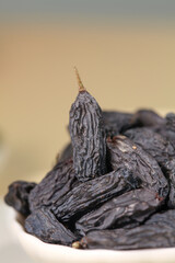 Xinjiang Turpan Black Raisins in Bowl - Premium Dried Fruit from China