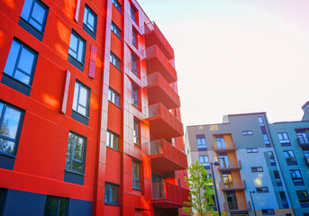 Brightly Colored Modern Buildings Under Clear Sky During Day Showcasing Urban Architecture Design....