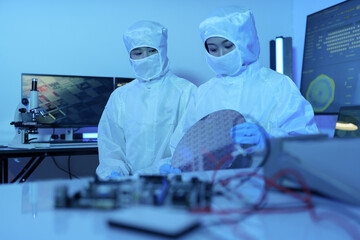 Technician working on analyzing semiconductor or microchip boards, electronics industry, electronic engineer, computer technology, CPU	
