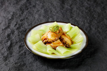 Steamed Fresh Abalone with Golden Sauce on Lettuce - Premium Seafood Dish