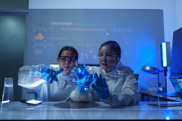 Engineers work in semiconductor or microchip labs in the electronics industry. Electronic engineers in computer technology, CPU maintenance, hardware, motherboard component upgrades.