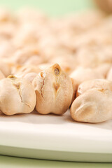 Fried Xinjiang Chickpeas - Crispy Salt Seasoned Cooked Legumes on White Plate