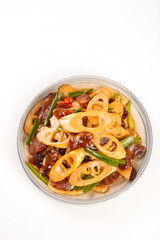 Asian Seafood Stir-Fry with Squid Rings Bamboo Shoots and Salami in Glass Bowl