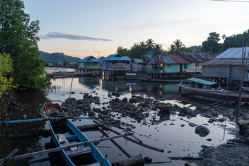 Fishermen village at sunset on Waleakodi Island, Togian archipelago, Indonesia
