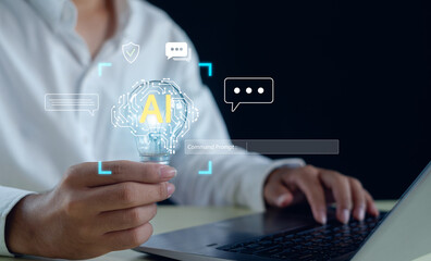Artificial intelligence and technology concept showing a person using a laptop and holding a glowing light bulb with AI symbol, representing innovation, communication, and digital transformation.