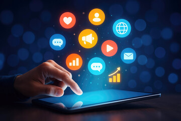 Hand interacting with social media icons on a tablet screen with bokeh background technology