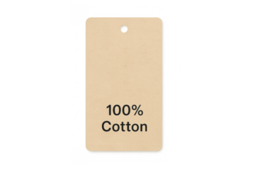 Cotton clothing tag displaying natural fiber information, representing eco-friendly fashion and sustainable product labeling