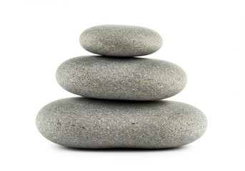 Fototapeta premium Stacked stones balance peacefully in minimalist composition