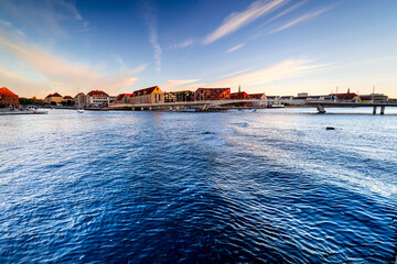 Copenhagen landscape with futuristic waterfront apartment buildings at sunset, Denmark, Scandinavia.	
