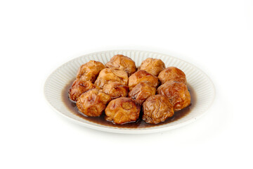 Stuffed Bean Curd Pockets with Pork Noodle Filling in Savory Oil Sauce on White Plate