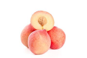 Fresh Summer Peaches Cut in Half Isolated on White Background