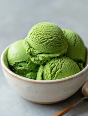 Matcha ice cream scoops in ceramic bowl close up studio shot delicious dessert treat refreshing green tea flavor sweet indulgence