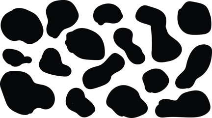 Abstract black organic shapes on a white background creating a dynamic pattern