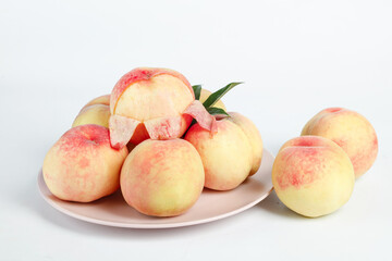 Fresh Summer Peaches on White Plate - Ripe Fruit Harvest with Sliced Pieces