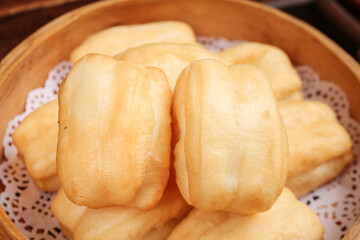 Traditional Crispy Golden Fritters in Bamboo Steamer - Delicious Asian Breakfast Pastry Must Have