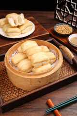 Crispy Golden Fritters in Bamboo Steamer Basket - Traditional Asian Breakfast Food