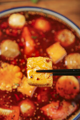 Hot Spicy Shabu Shabu Hot Pot with Delicious Variety of Ingredients and Fish Balls