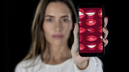 female with holding a smart phone - Powered by Adobe