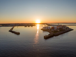 Aerial Sunset View of Olpenitz Harbor - Golden Hour Drone Shot Over Vacation Homes & Marina Baltic Sea Germany