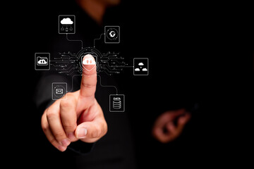 A hand touches a digital interface displaying various technology icons, symbolizing interaction with smart systems and data management.