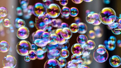 Floating soap bubbles shimmering with a spectrum of rainbow colors across their delicate, spherical surfaces, displaying an abstract, ethereal quality and light reflections