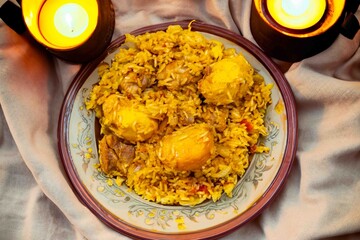 Traditional Brazilian dish of rice, chicken, and pequi ,caryocar brasiliense, known as Goiana chicken stew.	