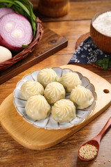 Steamed Meat Buns Asian Dumplings Traditional Breakfast Snacks Delicacies on Wooden Board