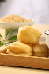 Traditional Golden Doughnuts on Wooden Board - Delicious Breakfast Essentials with Milk