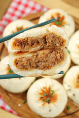 Fresh Steamed Buns with Beef Filling - Traditional Asian Breakfast Dumplings on Bamboo Steamer