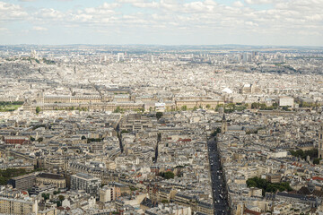 Fototapeta premium A panoramic view of the city of Paris, taken from the Montparnasse Tower in Paris, France The photo was taken in good weather, with no rain and clear skies
