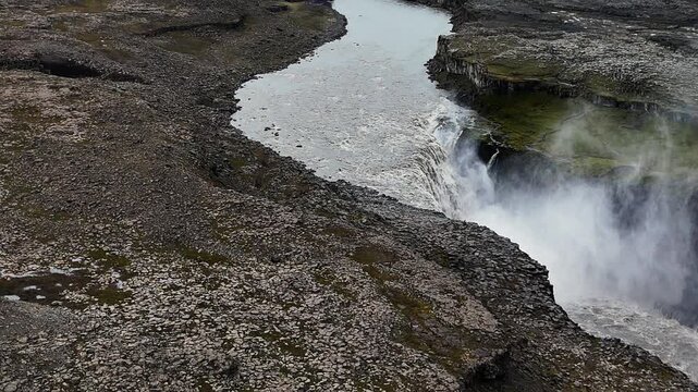 4k video of powerful Water Flowing On Detifoss Waterfall In Vatnajokull National Park In Iceland.
