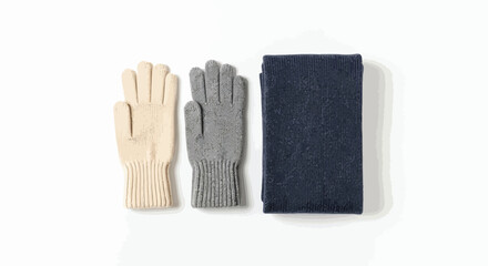 Knitted gloves and a folded scarf displayed on a clean white background flat lay