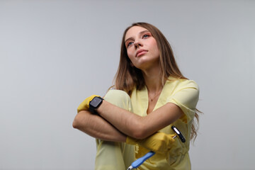 Young caucasian female healthcare professional with stethoscope reflective pose